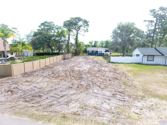 Land clearing beside house